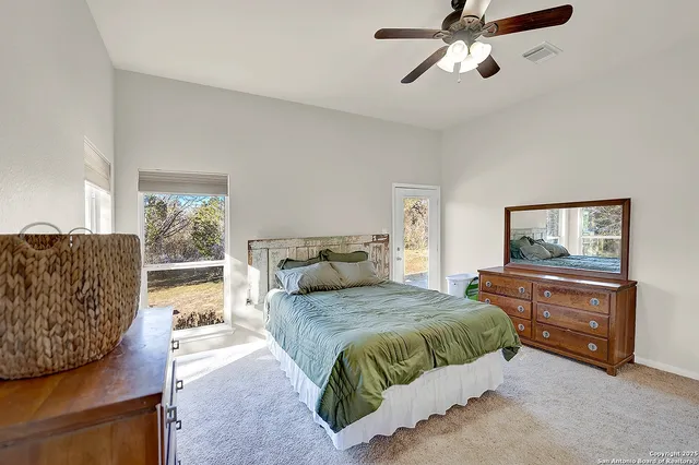 a view of a closet with storage and utility racks