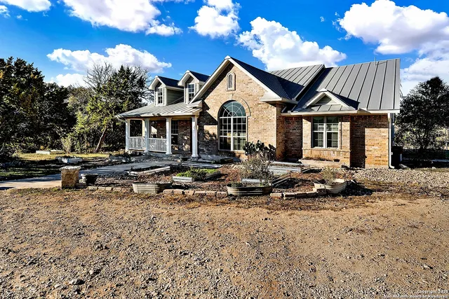 a view of a house with a patio