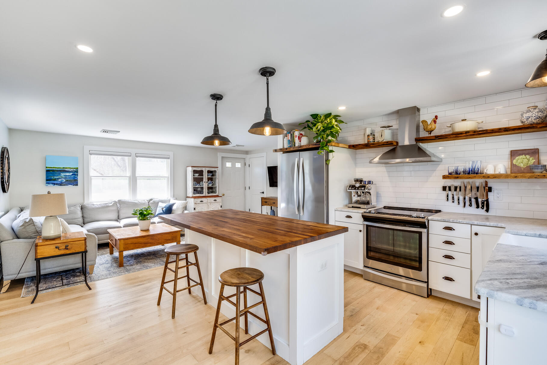 8 Rivers End Road Teaticket, MA 02536 - Photo 13 of 33 a kitchen with stainless steel appliances granite countertop a stove and cabinets