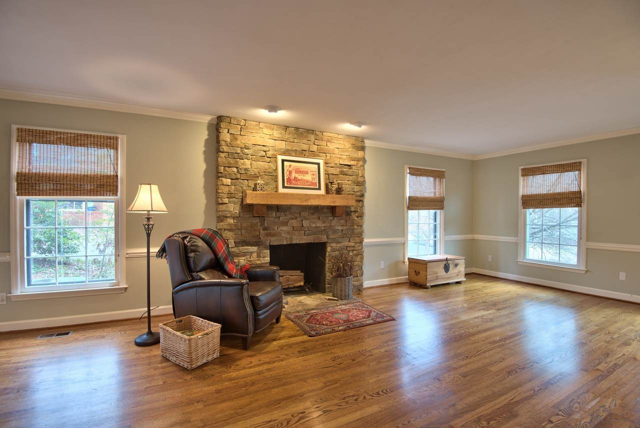 3916 St Marks Road Durham, NC 27707 - Photo 3 of 25 with beautiful stone wood-burning fireplace Den/Family/Great Room