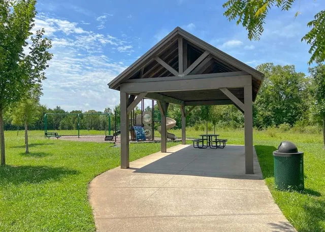 a front view of a house with yard