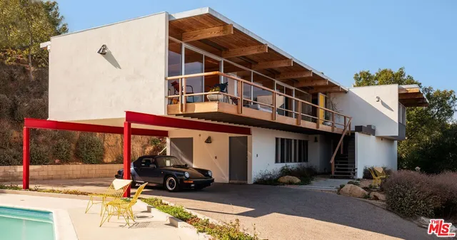 a view of a cars parked in front of a building