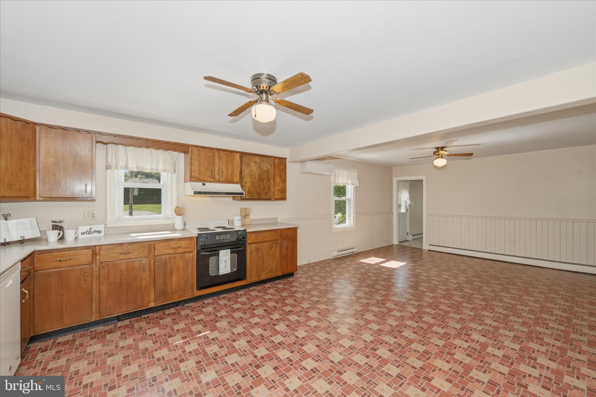 11205 Hessong Bridge Road Thurmont, MD 21788 - Photo 14 of 69 a view of a kitchen with a sink and a window