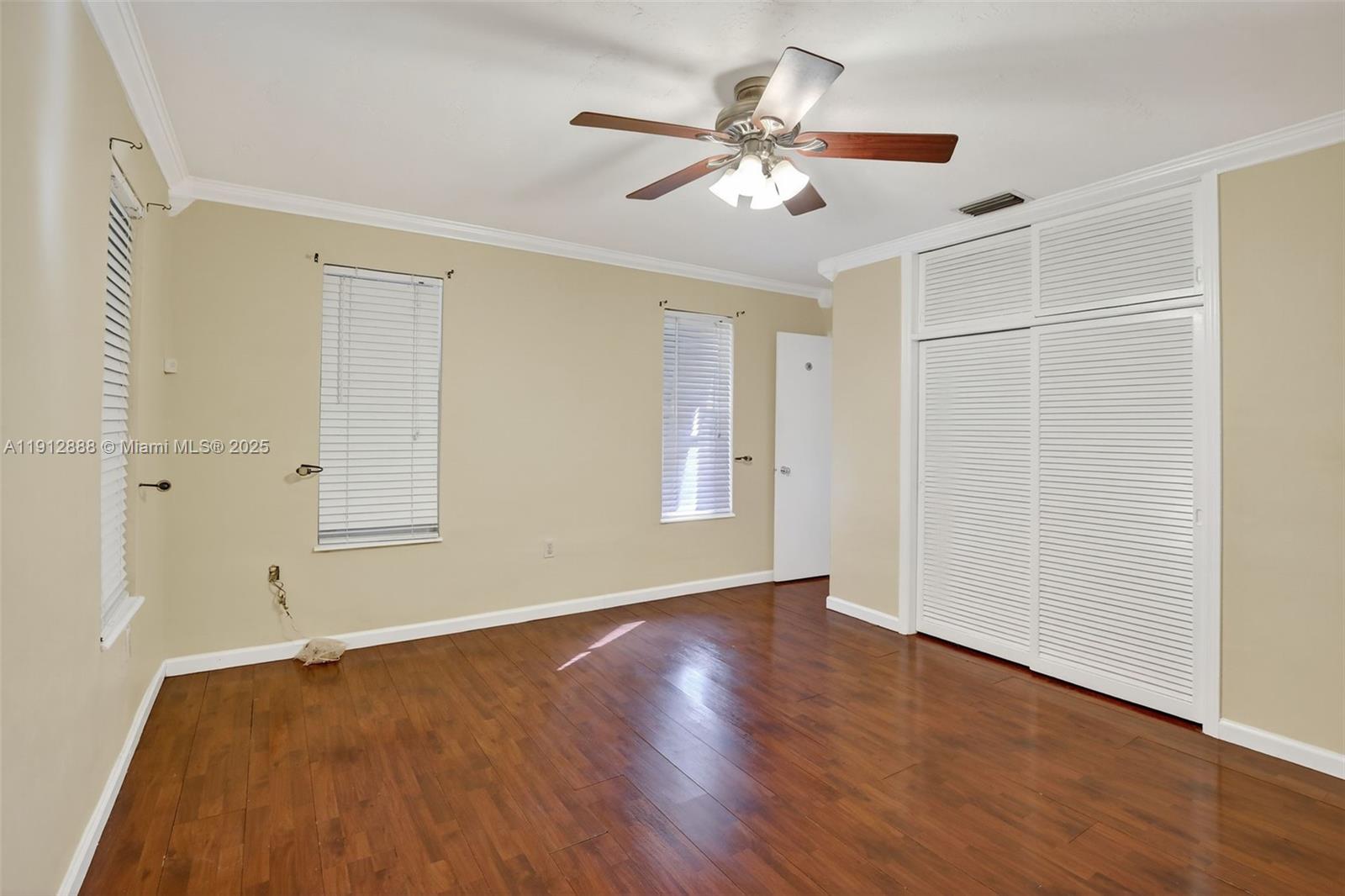 7920 Alhambra Boulevard Miramar, FL 33023 - Photo 21 of 38 a view of an empty room with wooden floor