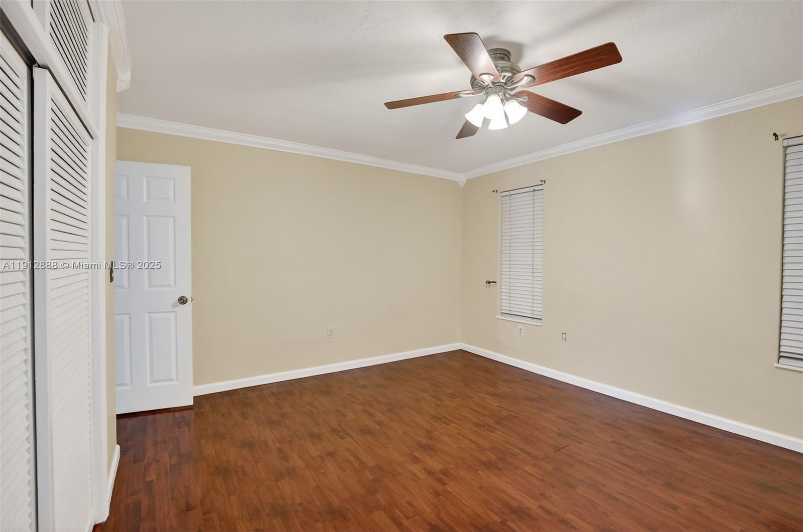 7920 Alhambra Boulevard Miramar, FL 33023 - Photo 24 of 38 a view of an empty room with wooden floor
