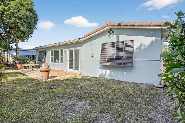 a outdoor space with pool and furniture