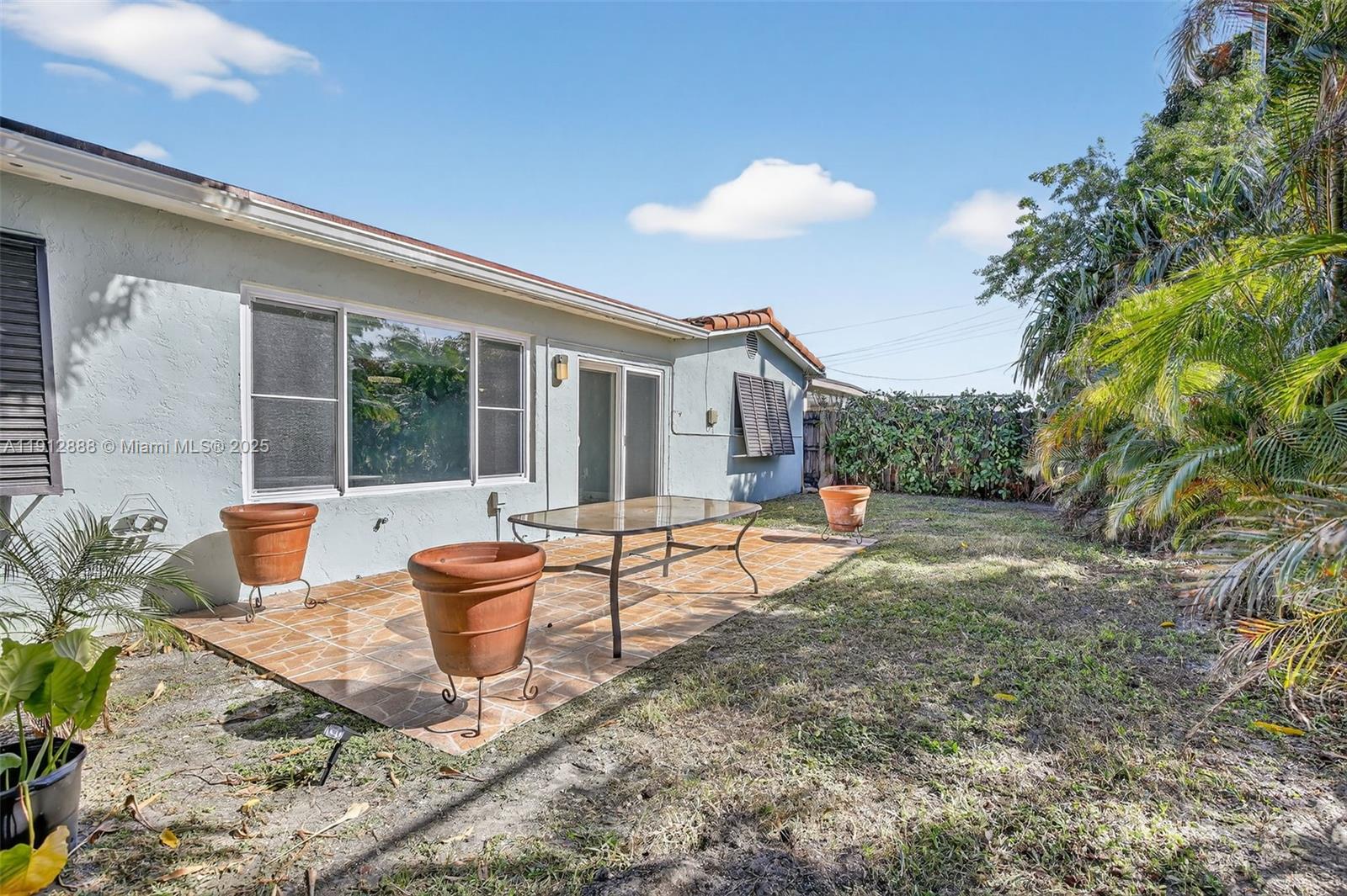 7920 Alhambra Boulevard Miramar, FL 33023 - Photo 37 of 38 a view of a house with backyard and sitting area