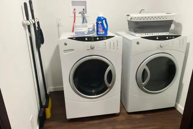 a utility room with dryer and washer