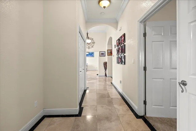 a spacious bathroom with a sink a large mirror and a shower