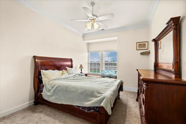 a view of a kitchen from the hallway with closet