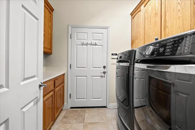 a view of a porch with wooden floor and fence