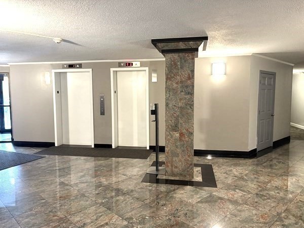 151 Coolidge Avenue, Unit 613 Watertown, MA 02472 - Photo 12 of 16 a view of a utility room with closet