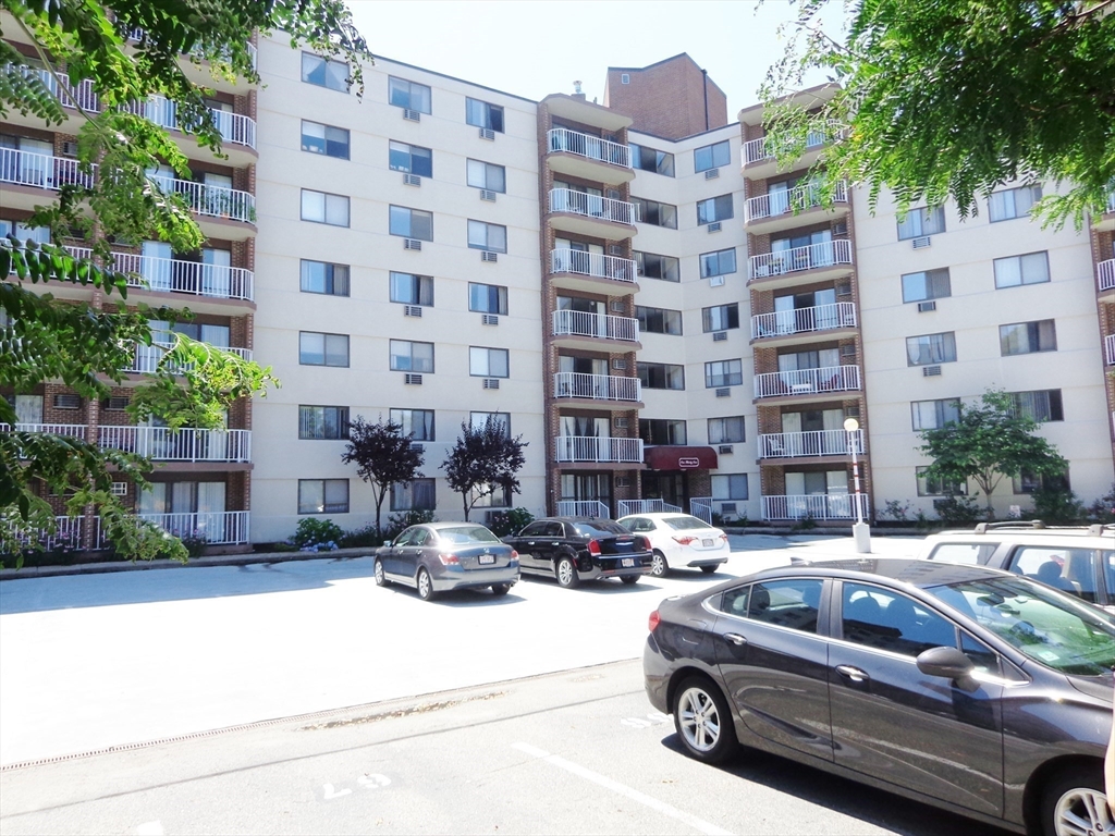 151 Coolidge Avenue, Unit 613 Watertown, MA 02472 - Photo 2 of 16 a view of a car parked in front of a building