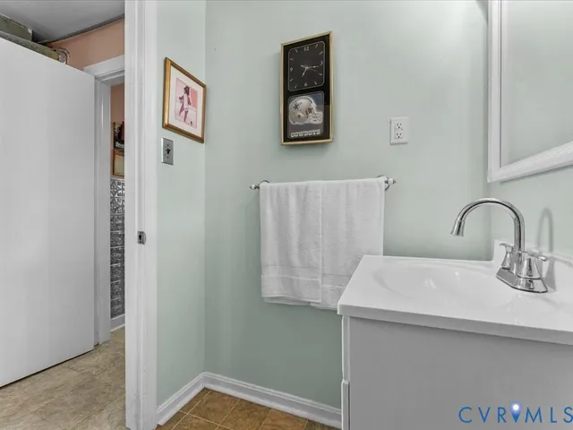 a view of workspace with furniture and fan