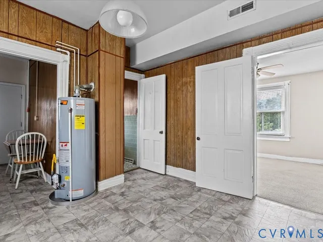 a utility room with cabinets