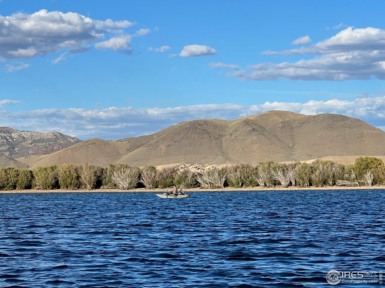 996 Thirty Six Lane Livermore, CO 80536 - Photo 2 of 11 a view of an outdoor space and mountain view