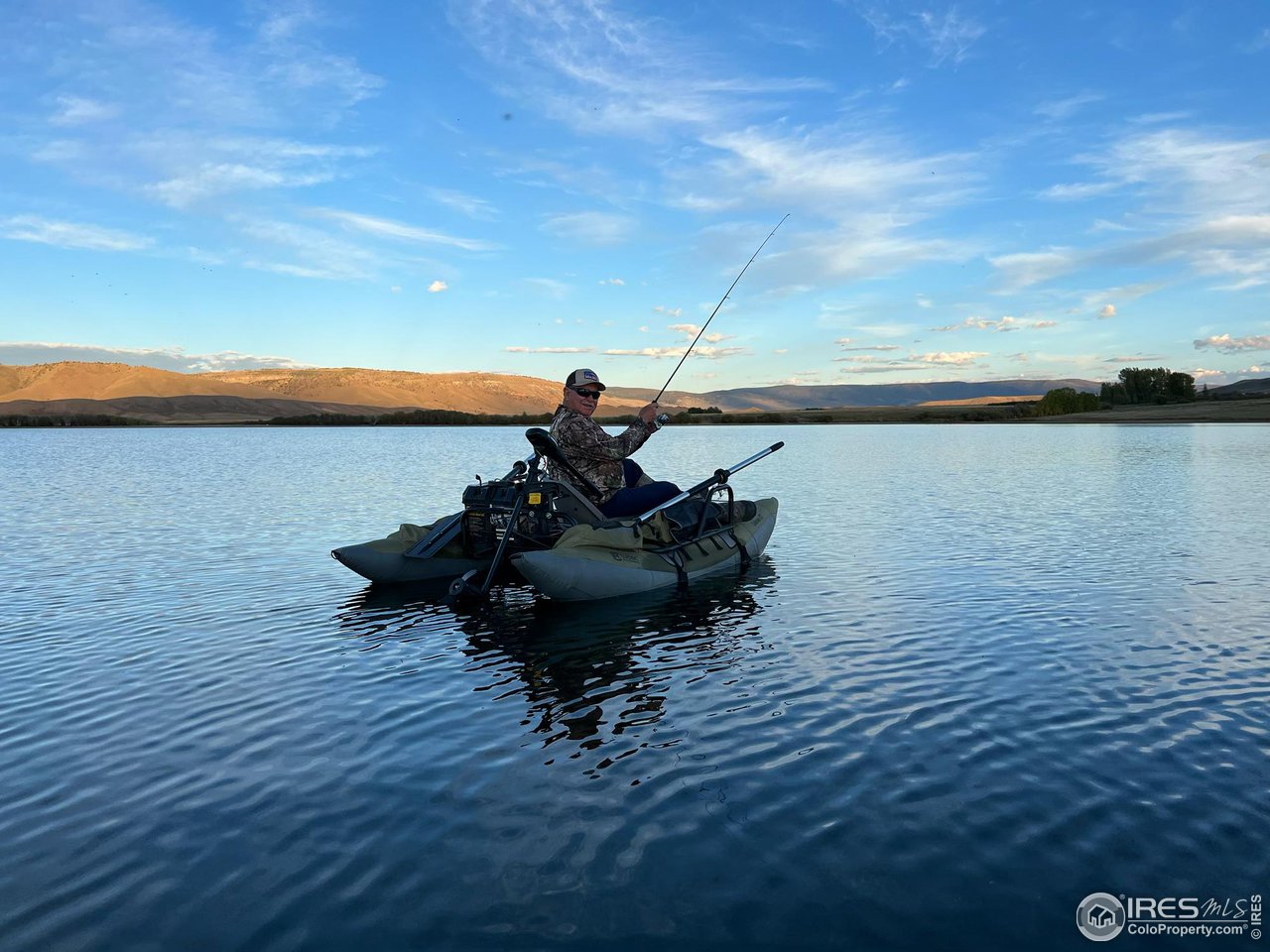 996 Thirty Six Lane Livermore, CO 80536 - Photo 7 of 11 a view of a lake with a beach