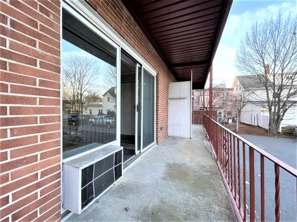 625 Main Street, Unit 10 Reading, MA 01867 - Photo 5 of 5 a view of balcony with city view