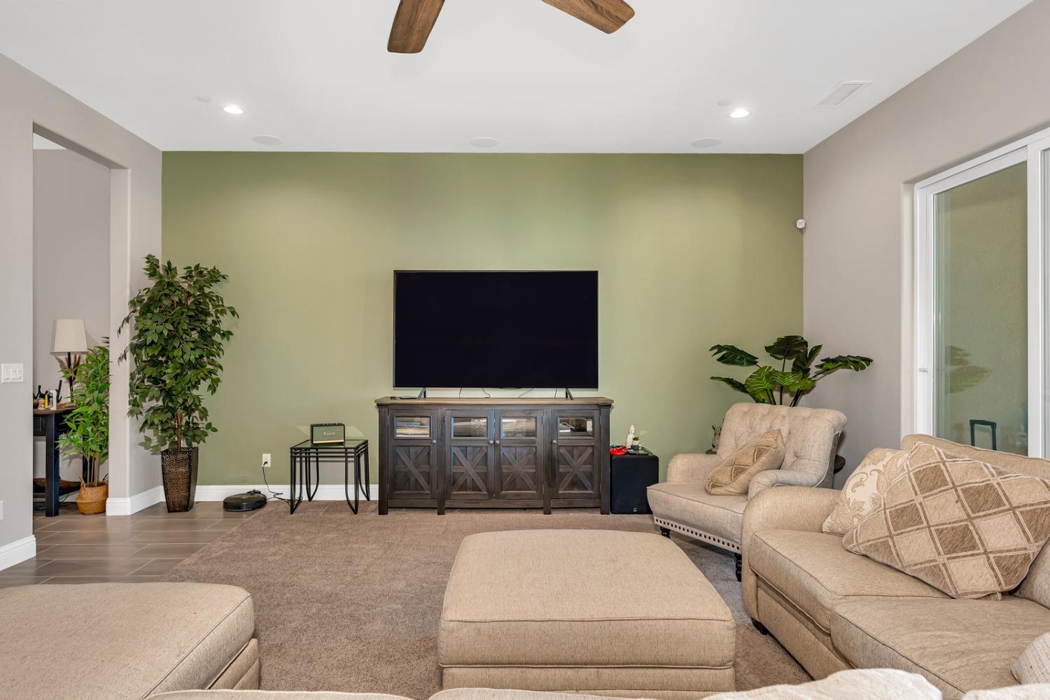 1053 Beaver Pond Loop Madera, CA 93636 - Photo 13 of 81 a living room with furniture and a flat screen tv