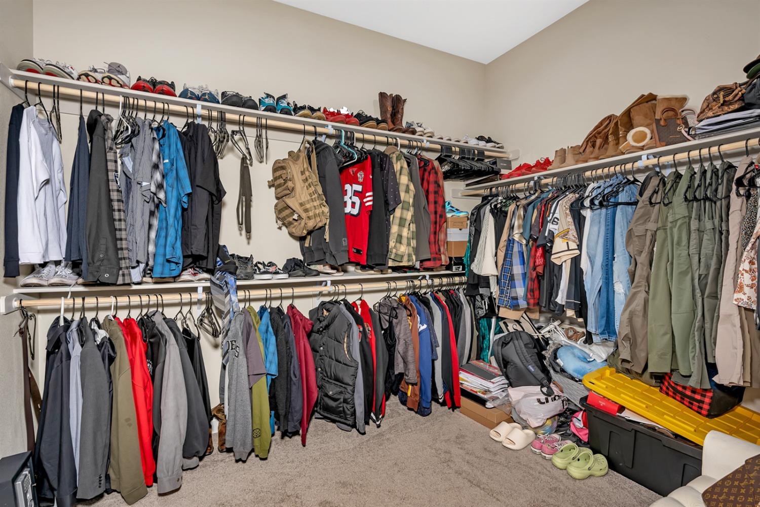 1053 Beaver Pond Loop Madera, CA 93636 - Photo 30 of 81 a view of walk in closet with clothes