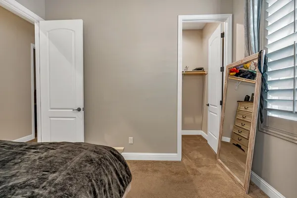 a view of a swimming pool with outdoor seating