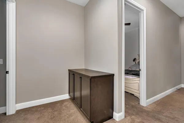 a view of a chairs and table in a room
