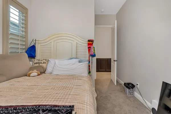 a view of a lake with couches in the patio