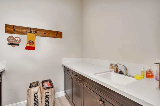 a view of a city with an ocean in between two buildings