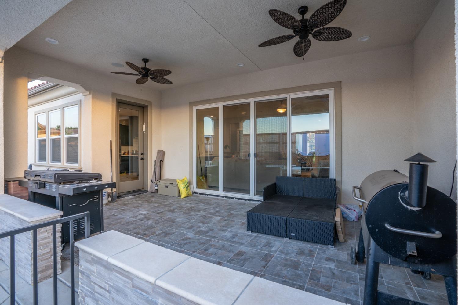 1053 Beaver Pond Loop Madera, CA 93636 - Photo 56 of 81 a living room with furniture and a window