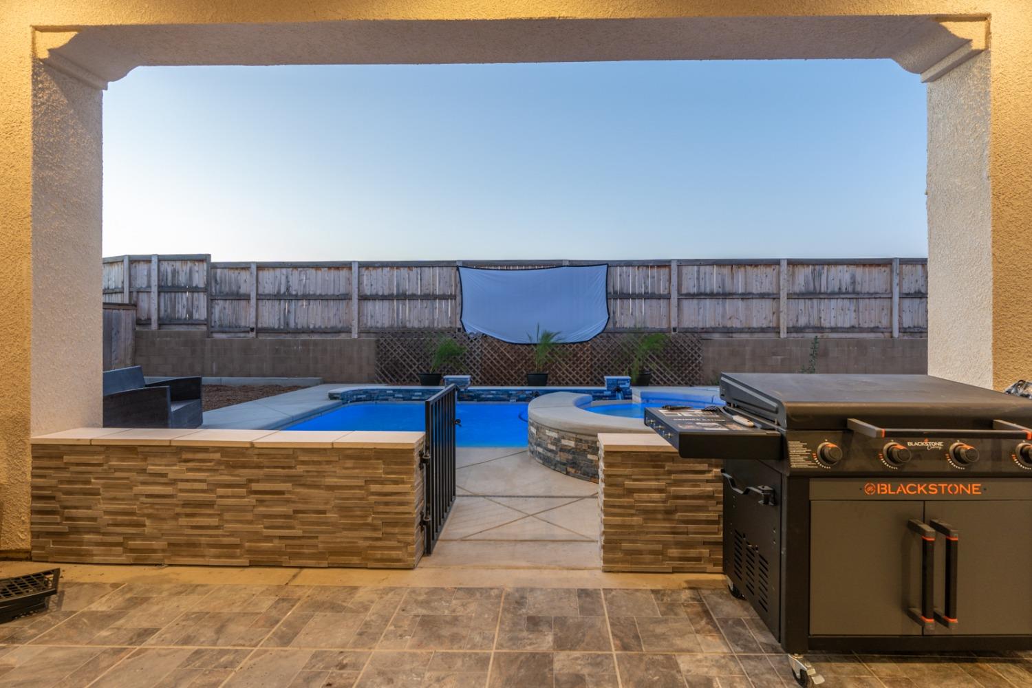 1053 Beaver Pond Loop Madera, CA 93636 - Photo 57 of 81 a view of a chairs and table in the terrace