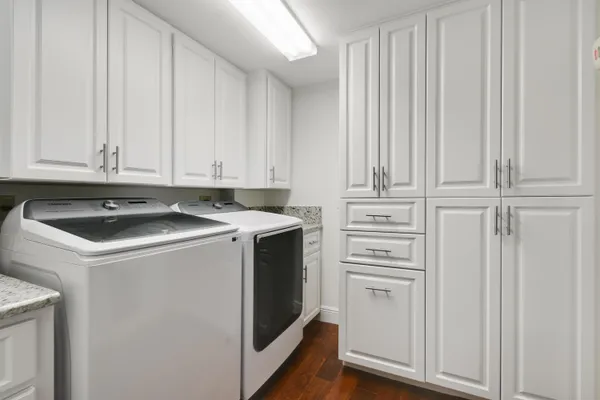 a utility room with dryer and washer