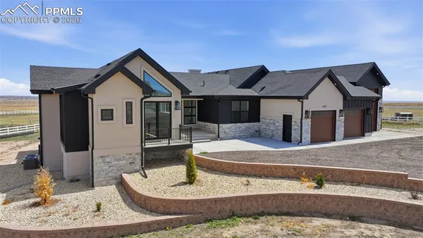 a house view with a backyard space
