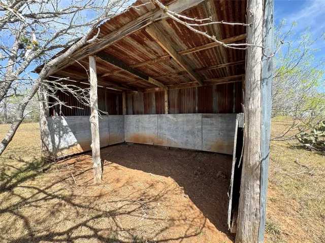 a view of a backyard of a house