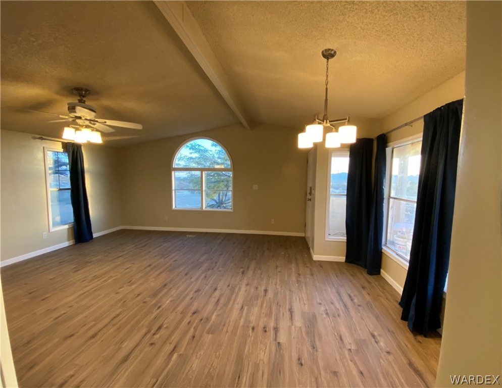 5272 Cove Road Golden Valley, AZ 86413 - Photo 3 of 24 a view of a room with window and wooden floor
