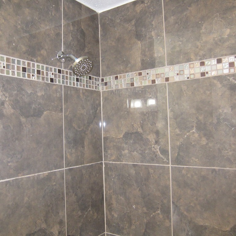 138 Endecott Street Springfield, MA 01118 - Photo 7 of 30 a bathroom with a shower