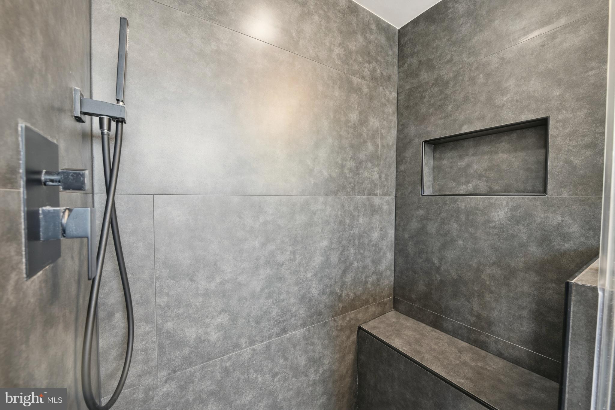 916 G St. Northwest, Unit 903 Washington, DC 20001 - Photo 26 of 65 a bathroom with a shower