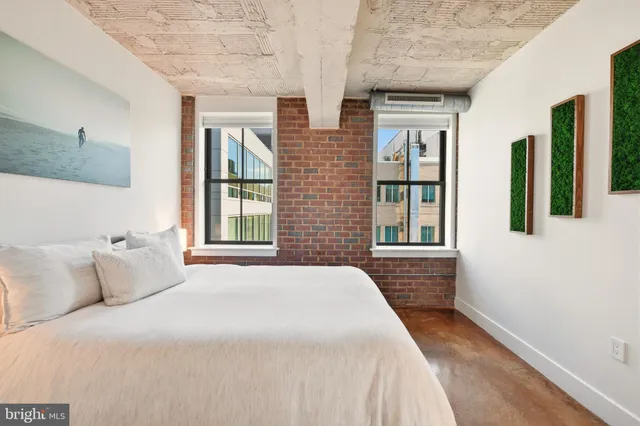 a bathroom with a sink toilet and a mirror