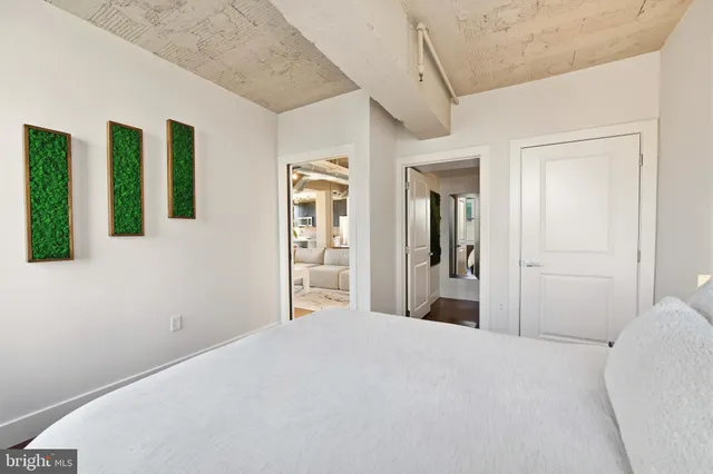 a view of a living room with a washer and dryer