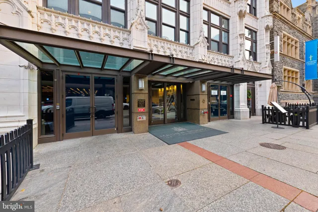 a view of a swimming pool and an outdoor seating
