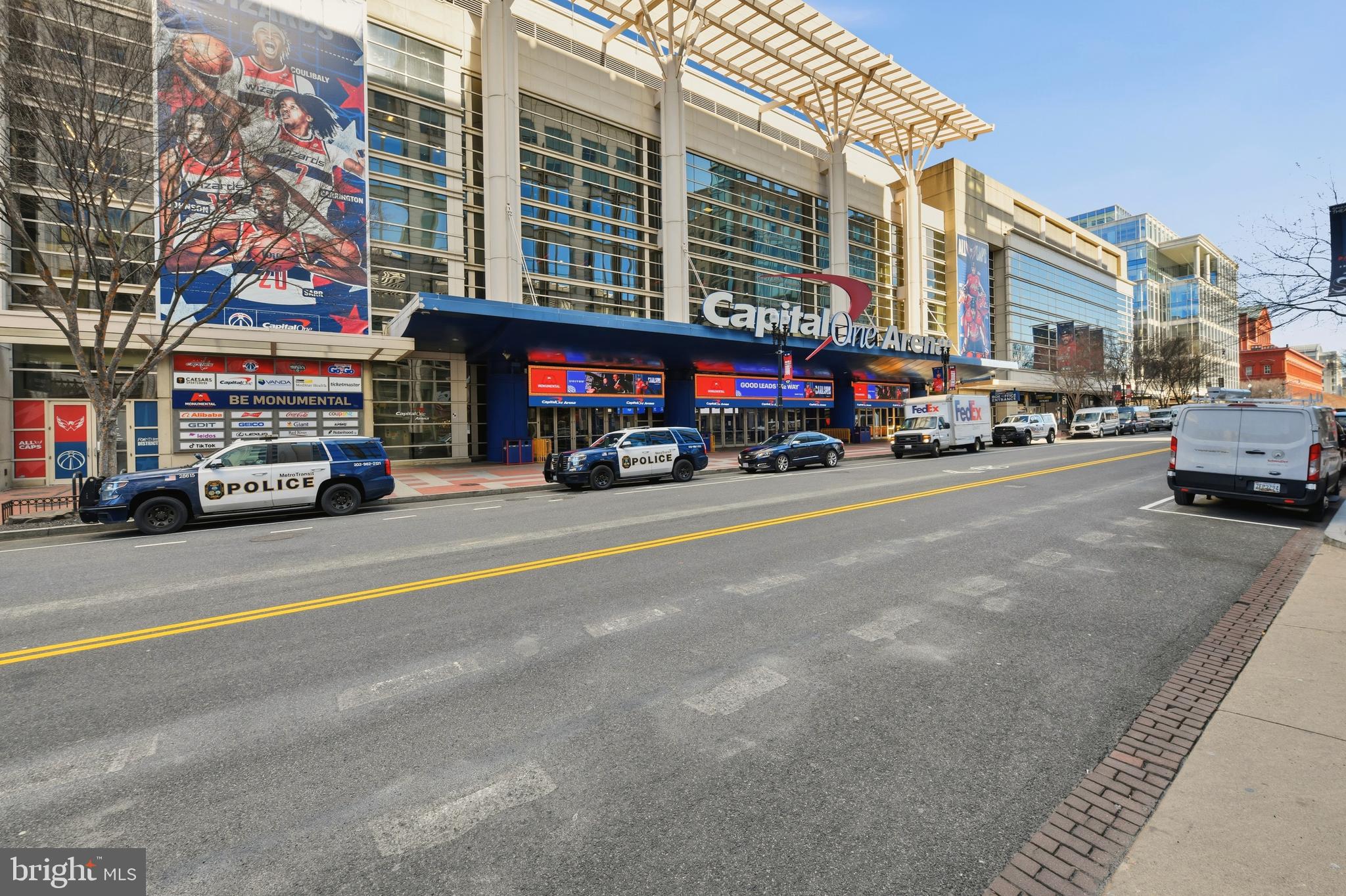 916 G St. Northwest, Unit 903 Washington, DC 20001 - Photo 47 of 65 a view of a street in a cars park in front of a building