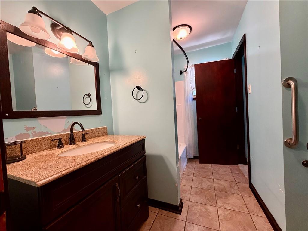 121 Kemar Drive Butler, PA 16002 - Photo 20 of 31 a bathroom with a sink vanity and a mirror
