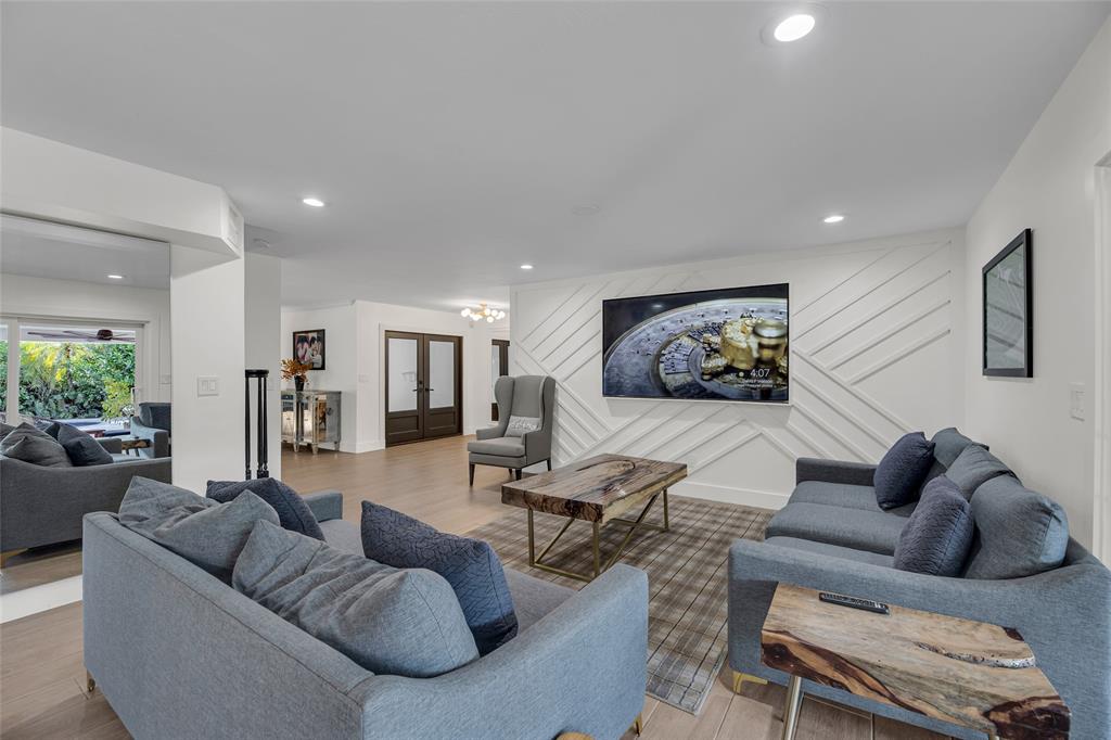 2 Mendota Lane Sea Ranch Lakes, FL 33308 - Photo 21 of 64 a living room with furniture and a large window