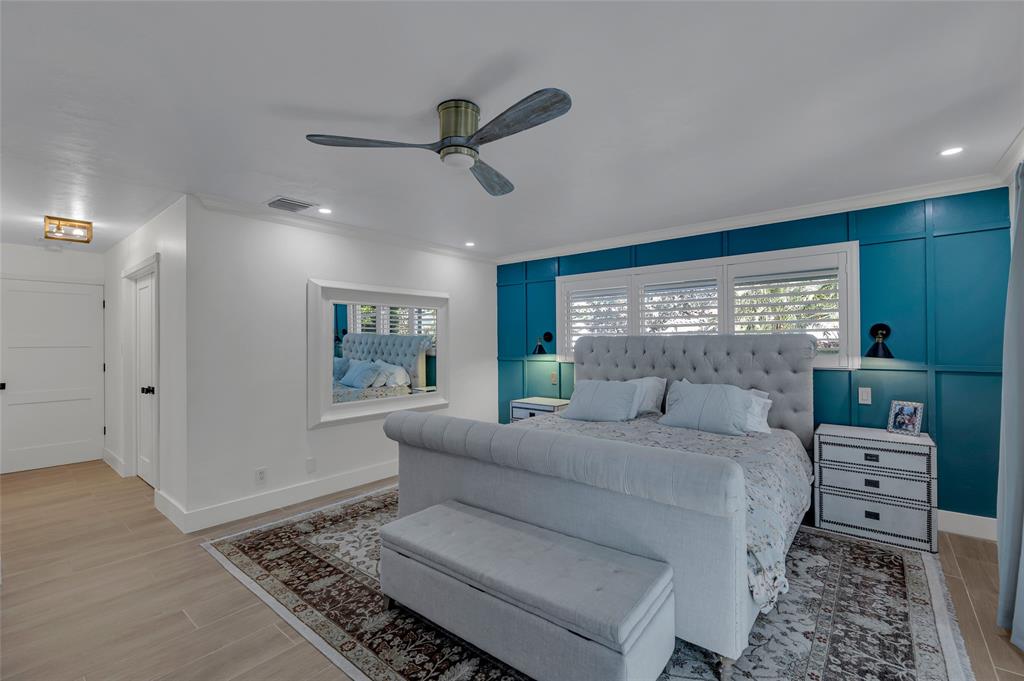 2 Mendota Lane Sea Ranch Lakes, FL 33308 - Photo 49 of 64 a living room with furniture and a large window