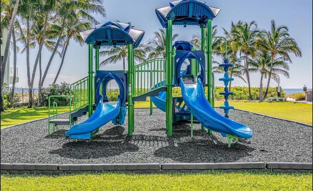 2 Mendota Lane Sea Ranch Lakes, FL 33308 - Photo 61 of 64 a view of a park with slide and swimming pool