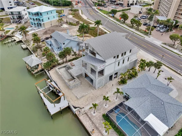 an aerial view of a house with outdoor space