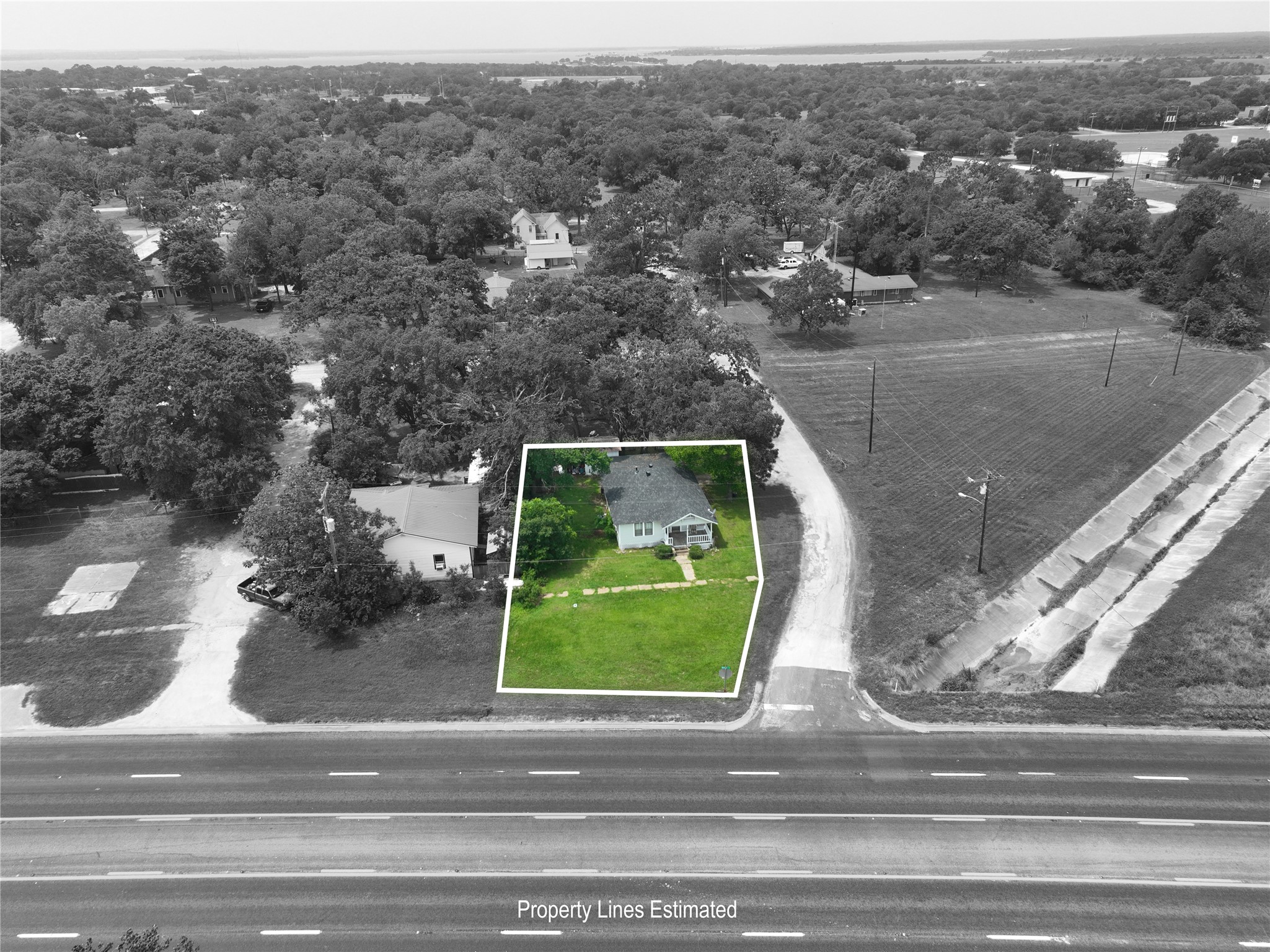 17066 Highway 36 Somerville, TX 77879 - Photo 8 of 16 an aerial view of a house with a yard