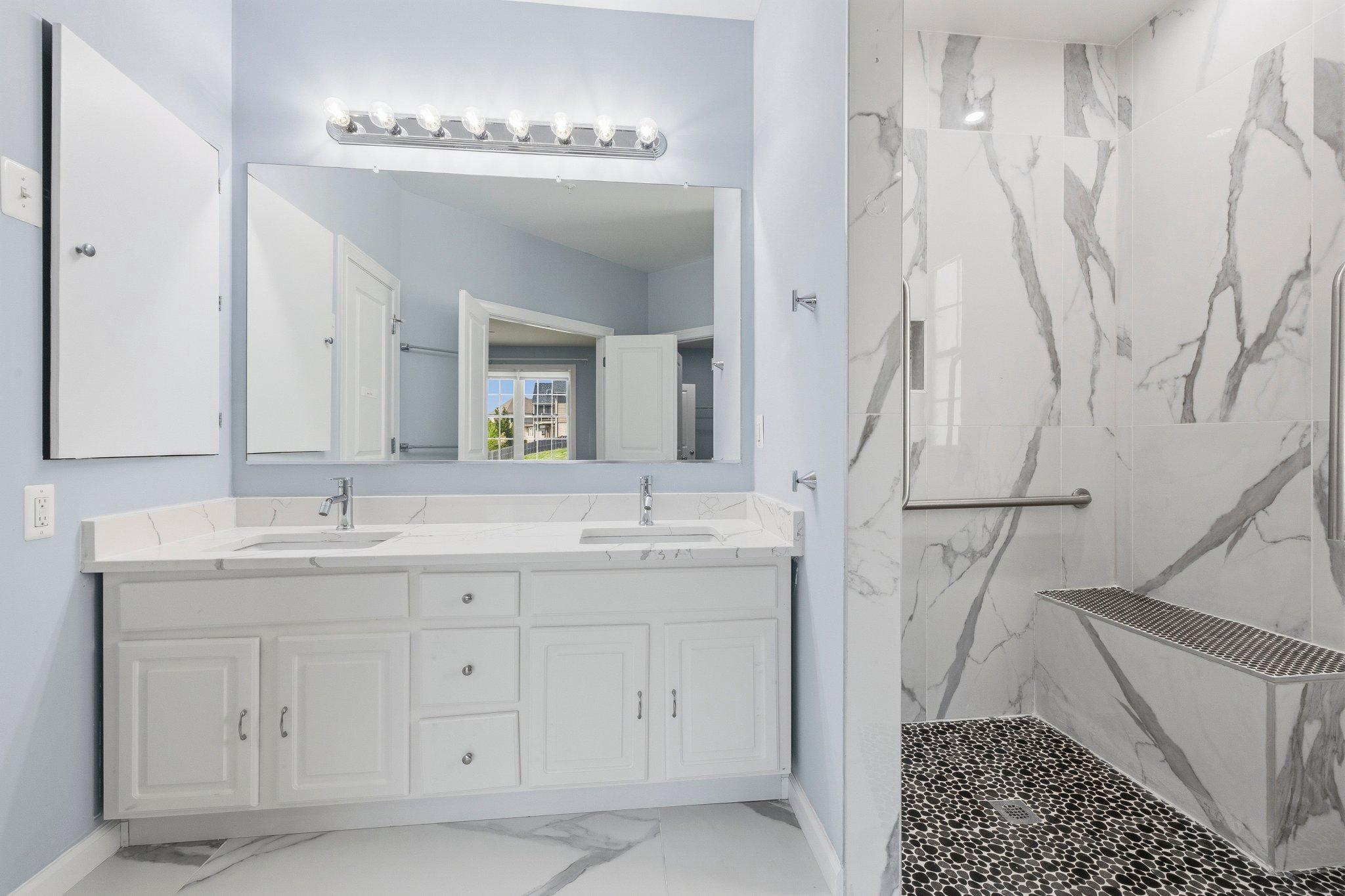 1105 Verbena Court Silver Spring, MD 20906 - Photo 24 of 78 Elegant primary bathroom with lots of storage.