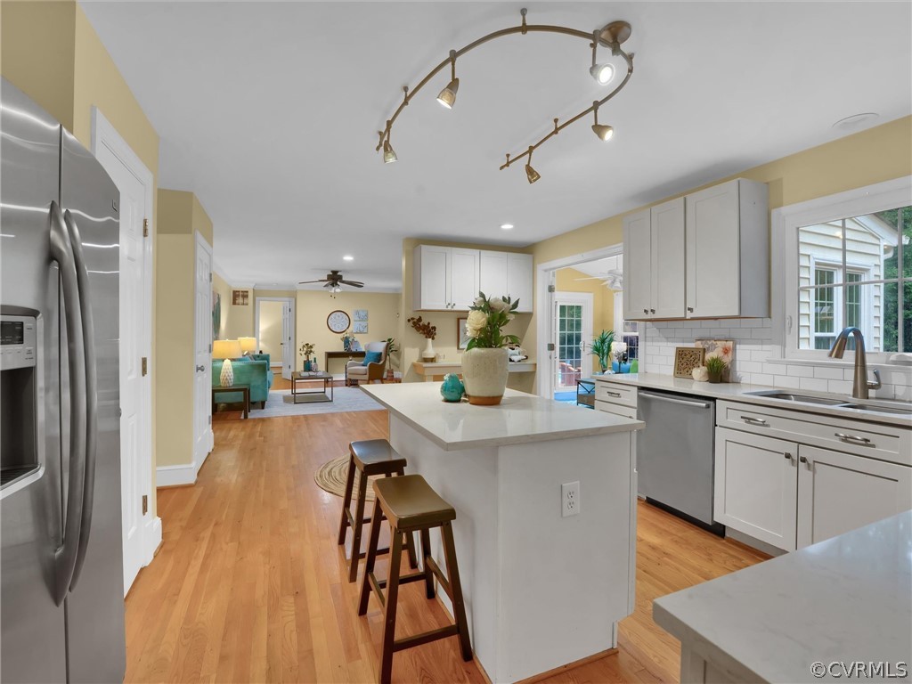 12100 2nd Branch Road Chesterfield, VA 23838 - Photo 12 of 41 a kitchen with stainless steel appliances granite countertop a sink refrigerator and cabinets