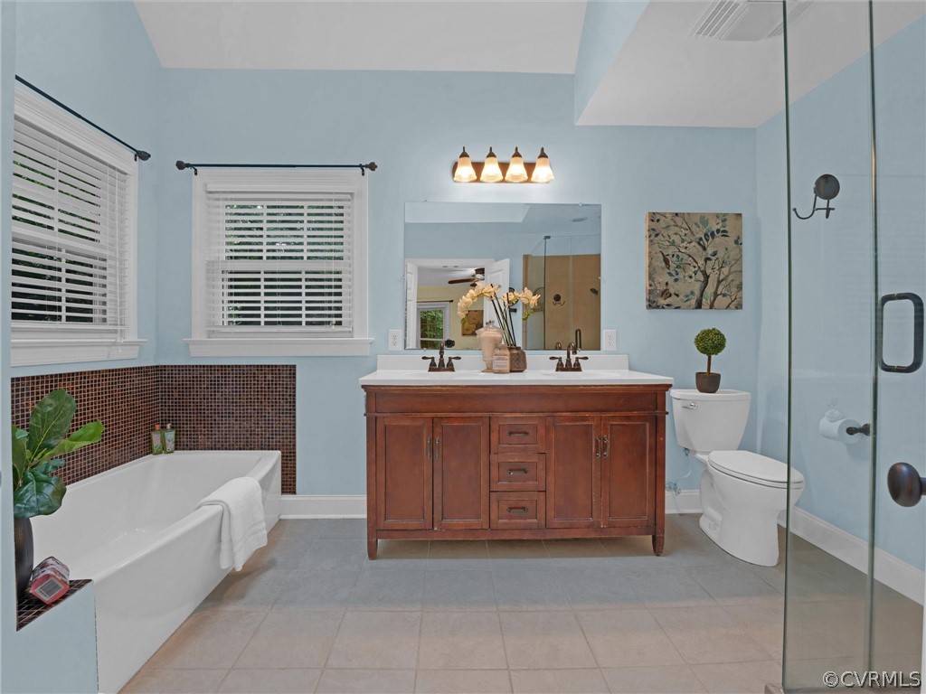 12100 2nd Branch Road Chesterfield, VA 23838 - Photo 20 of 41 a spacious bathroom with a sink a bathtub and a toilet
