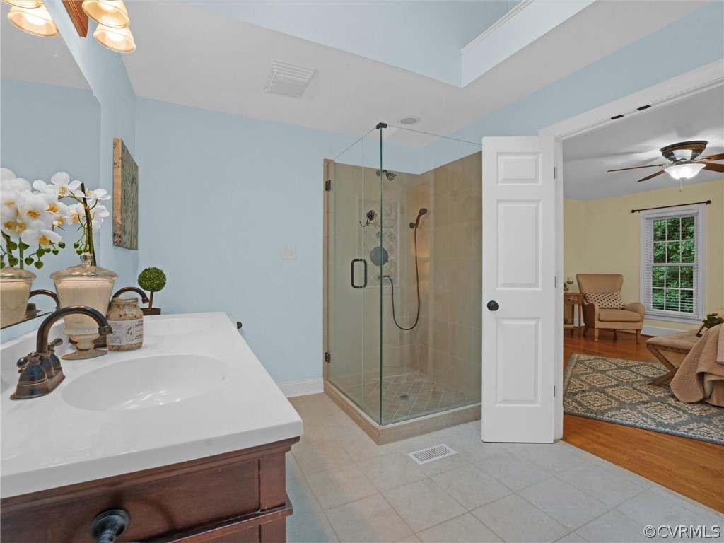 12100 2nd Branch Road Chesterfield, VA 23838 - Photo 21 of 41 a bathroom with a shower sink and mirror